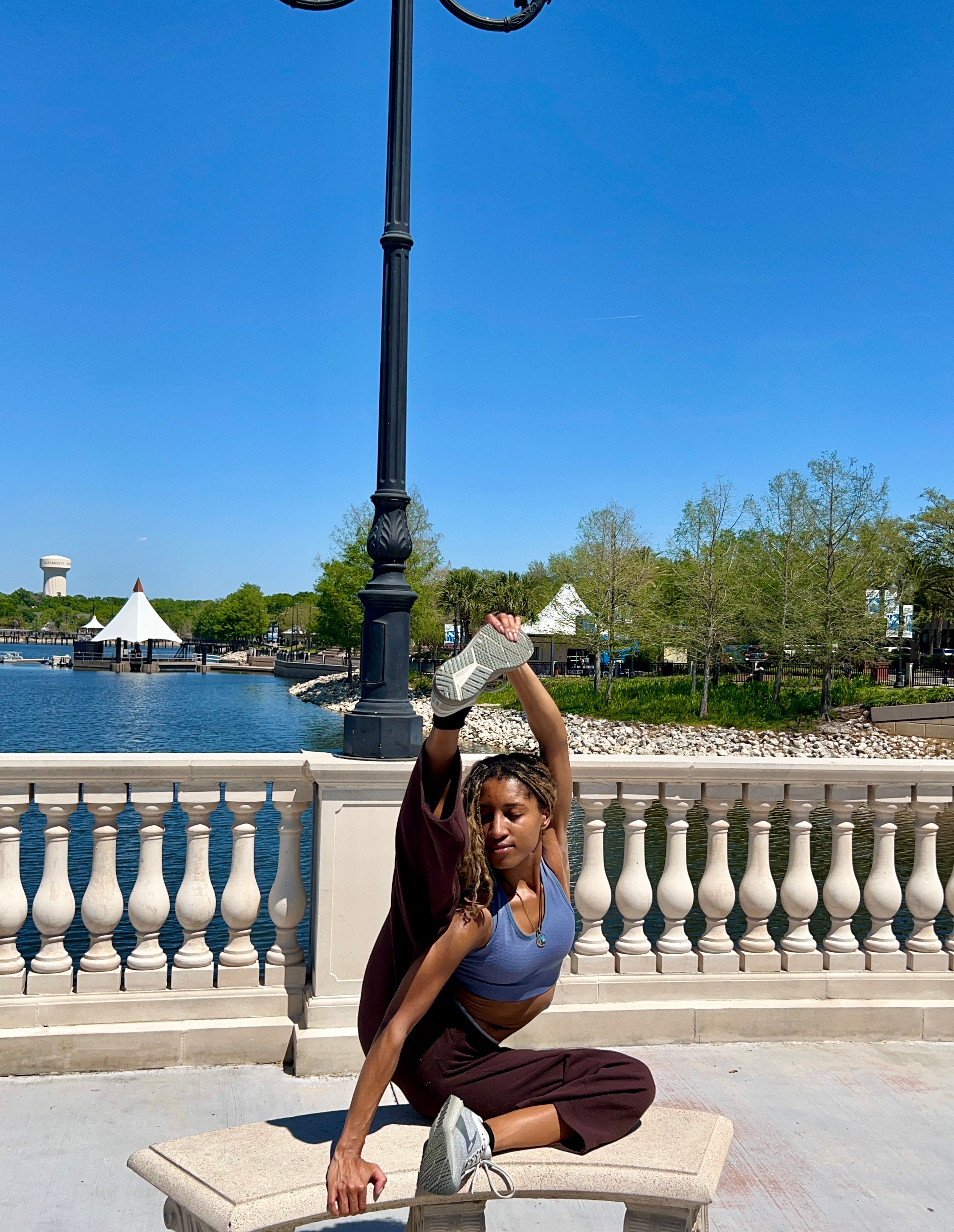 Compass yoga pose in park